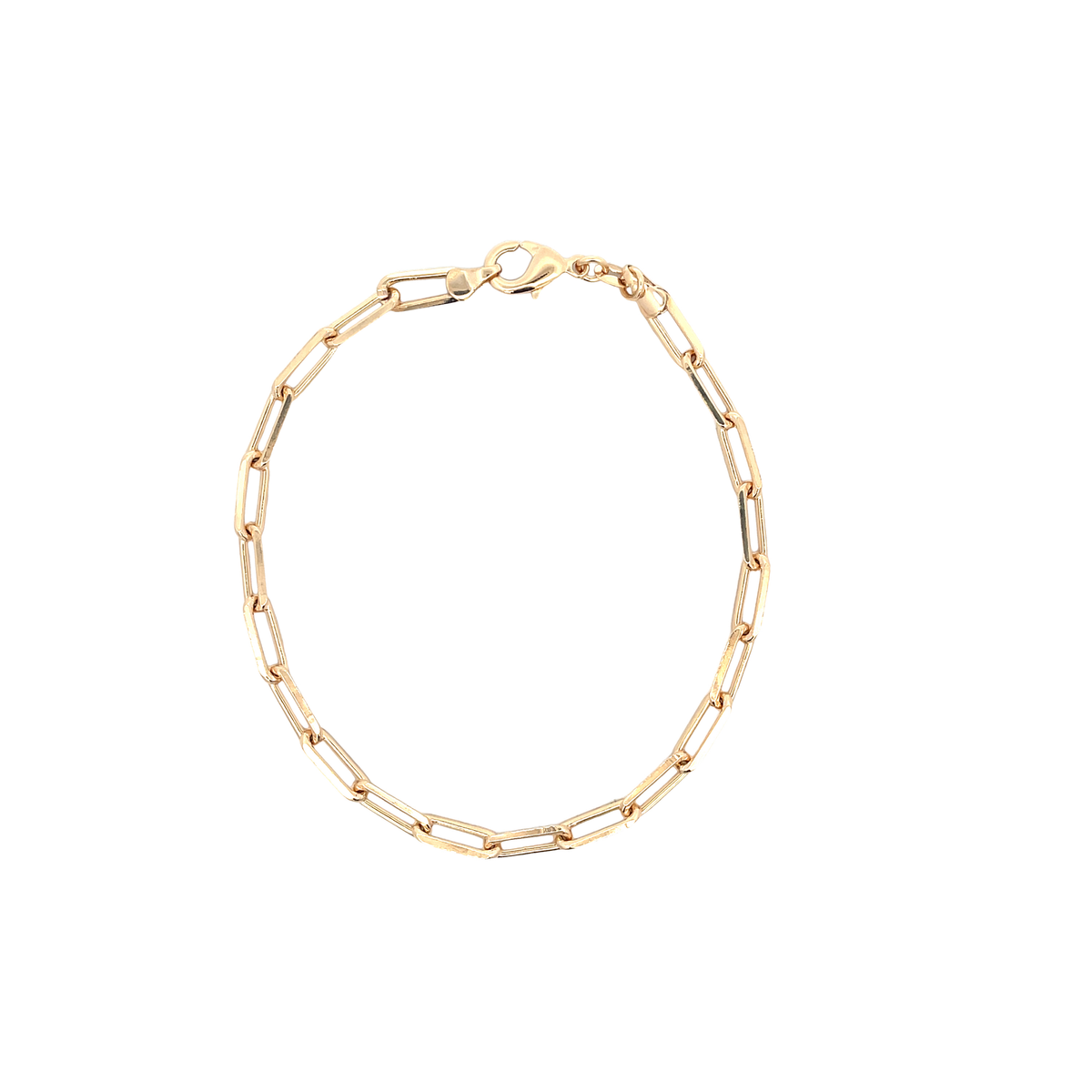 A delicate gold paperclip chain bracelet rests in a circle against a clean white background.