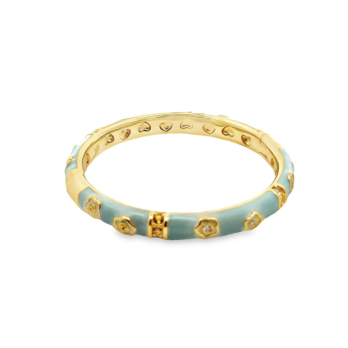 A gold bangle bracelet features light blue enamel and sparkling flower motifs.