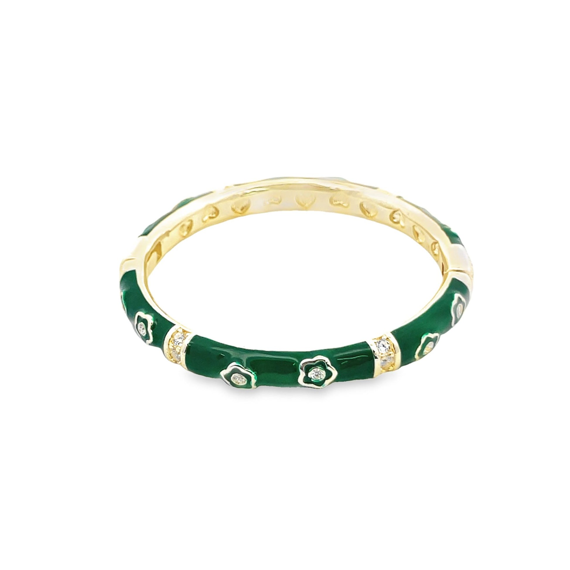 A gold bangle bracelet features vibrant green enamel and delicate flower motifs set with sparkling diamonds.