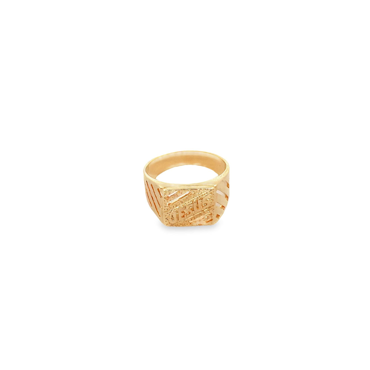 A gold signet ring featuring the word "Jesus" engraved on its textured square face sits against a plain white background.