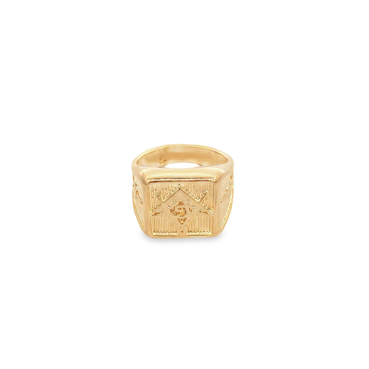 A polished gold signet ring displays an intricate Masonic square and compass engraving on its square face.