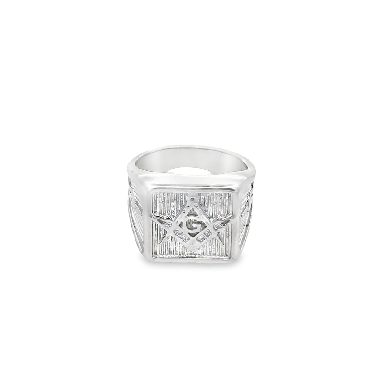 A polished silver Masonic ring displays the iconic square and compasses symbol with a central letter G on a textured rectangular face.