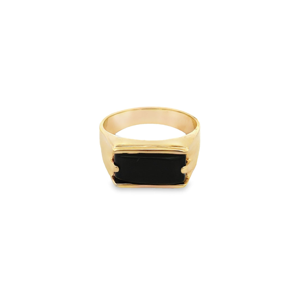 A sleek gold signet ring features a striking rectangular black onyx gemstone centered on its face.