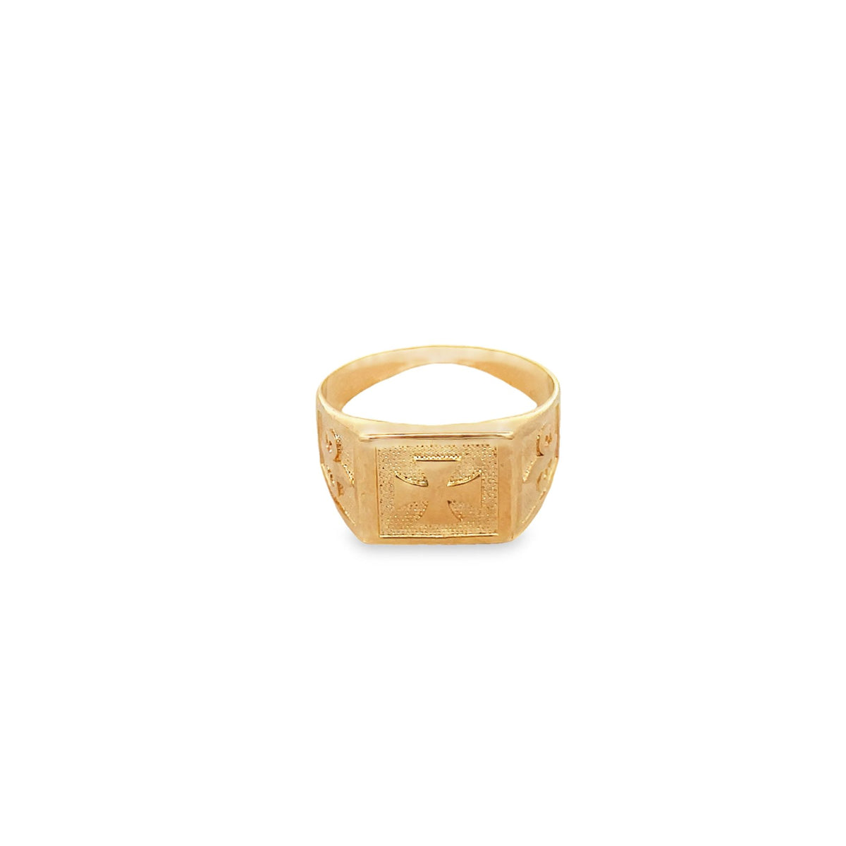 A polished gold signet ring features an embossed cross on its square face against a plain white background.