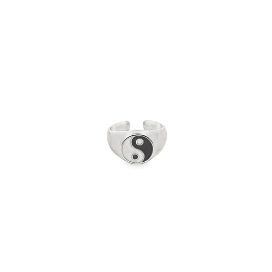 A silver adjustable ring features a black and white yin yang symbol on a plain white background.