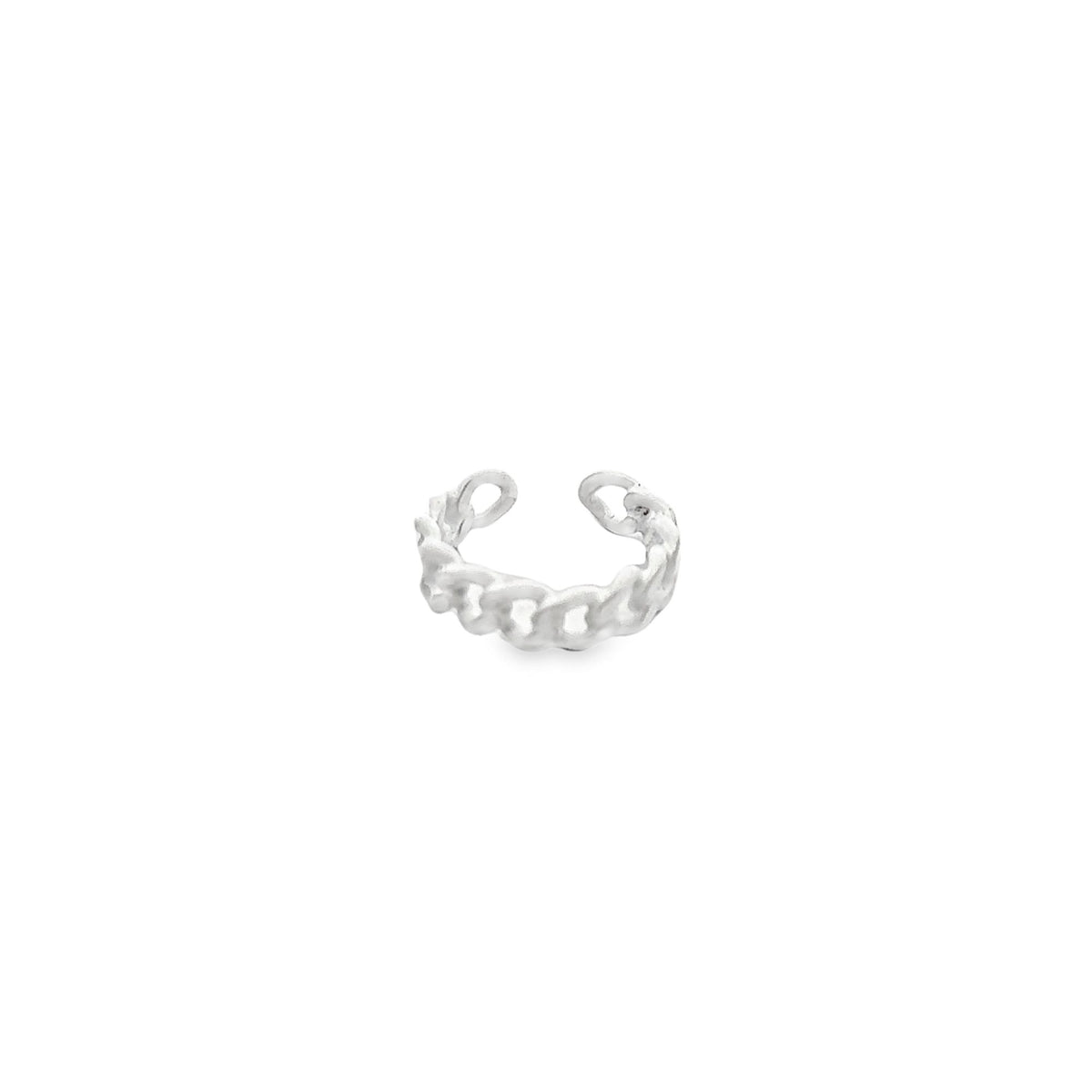 A sterling silver chain link ear cuff rests isolated on a white background.