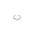 A sterling silver chain link ear cuff rests isolated on a white background.