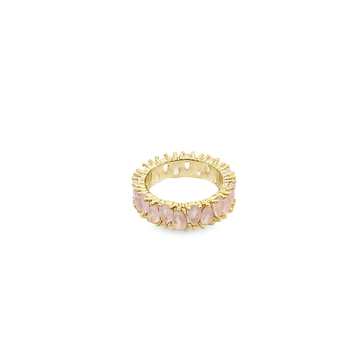 A gold eternity band features a continuous circle of prong-set, pear-shaped pink quartz stones against a plain white background.