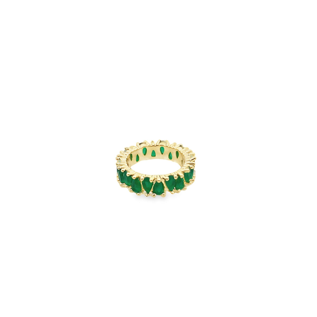 A gold eternity ring features a continuous band of vibrant pear-cut green gemstones against a clean white background.