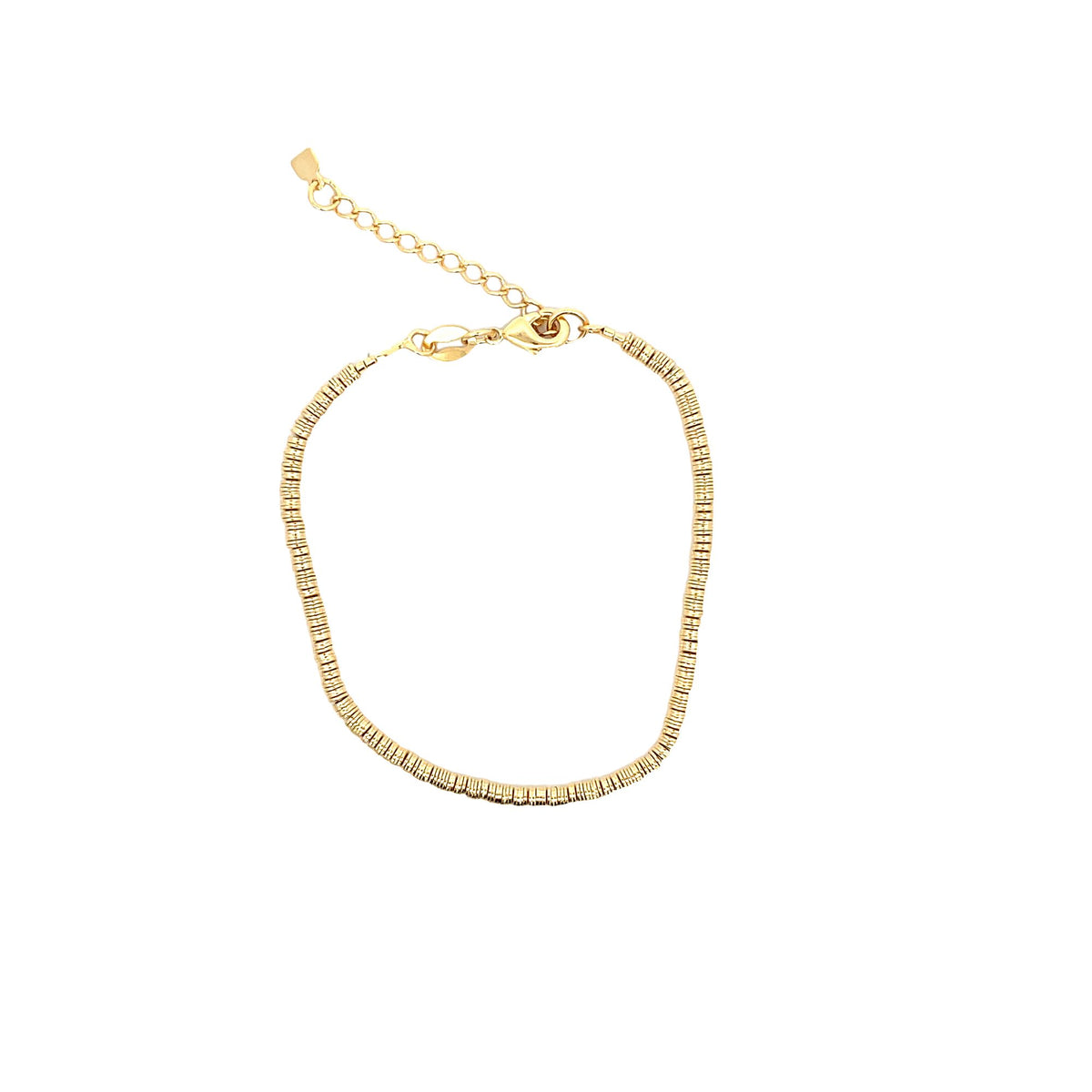A delicate gold disc bracelet features a shiny linked chain and an adjustable clasp against a clean white background.