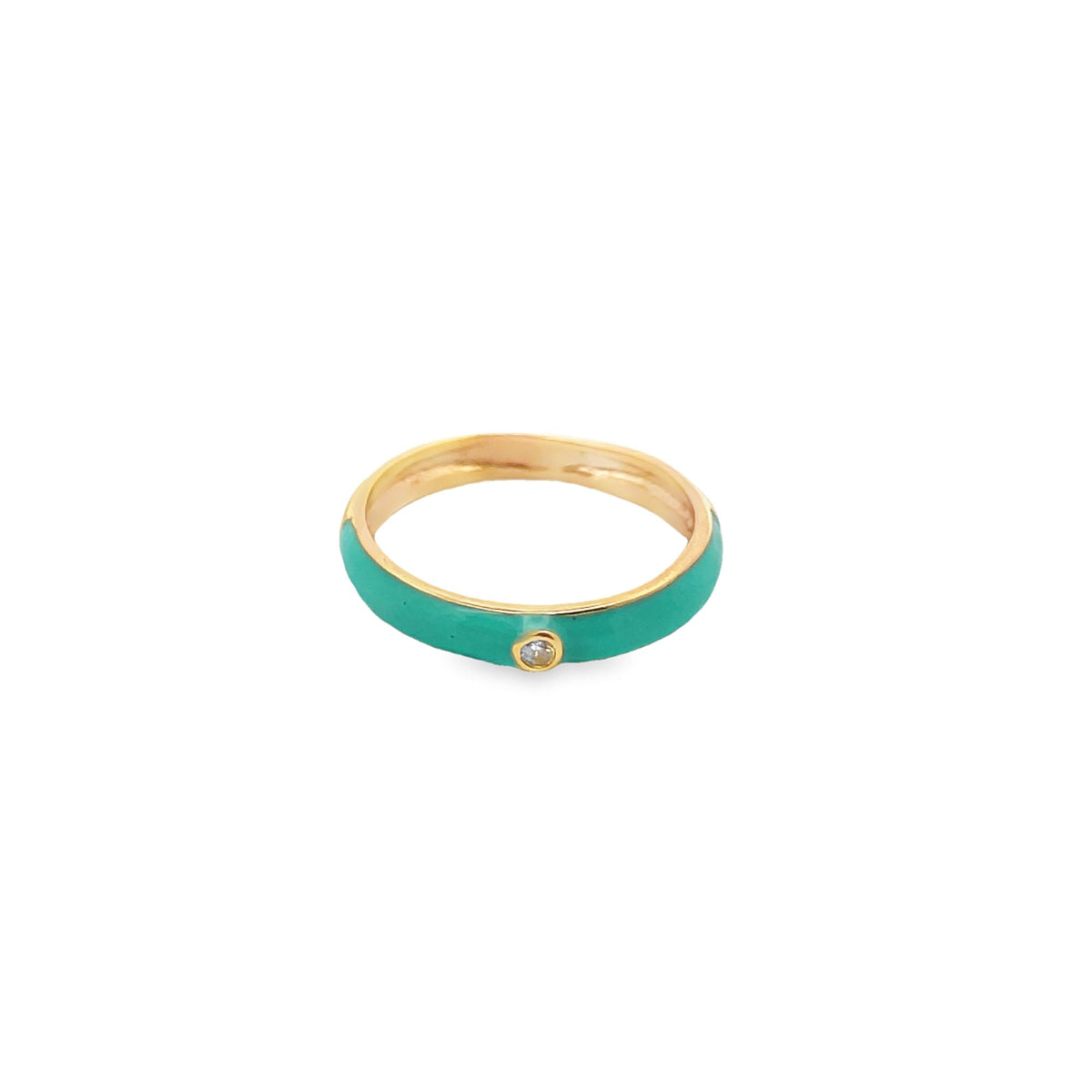 A delicate gold ring featuring a bright turquoise enamel band and a single embedded diamond rests on a clean white surface.