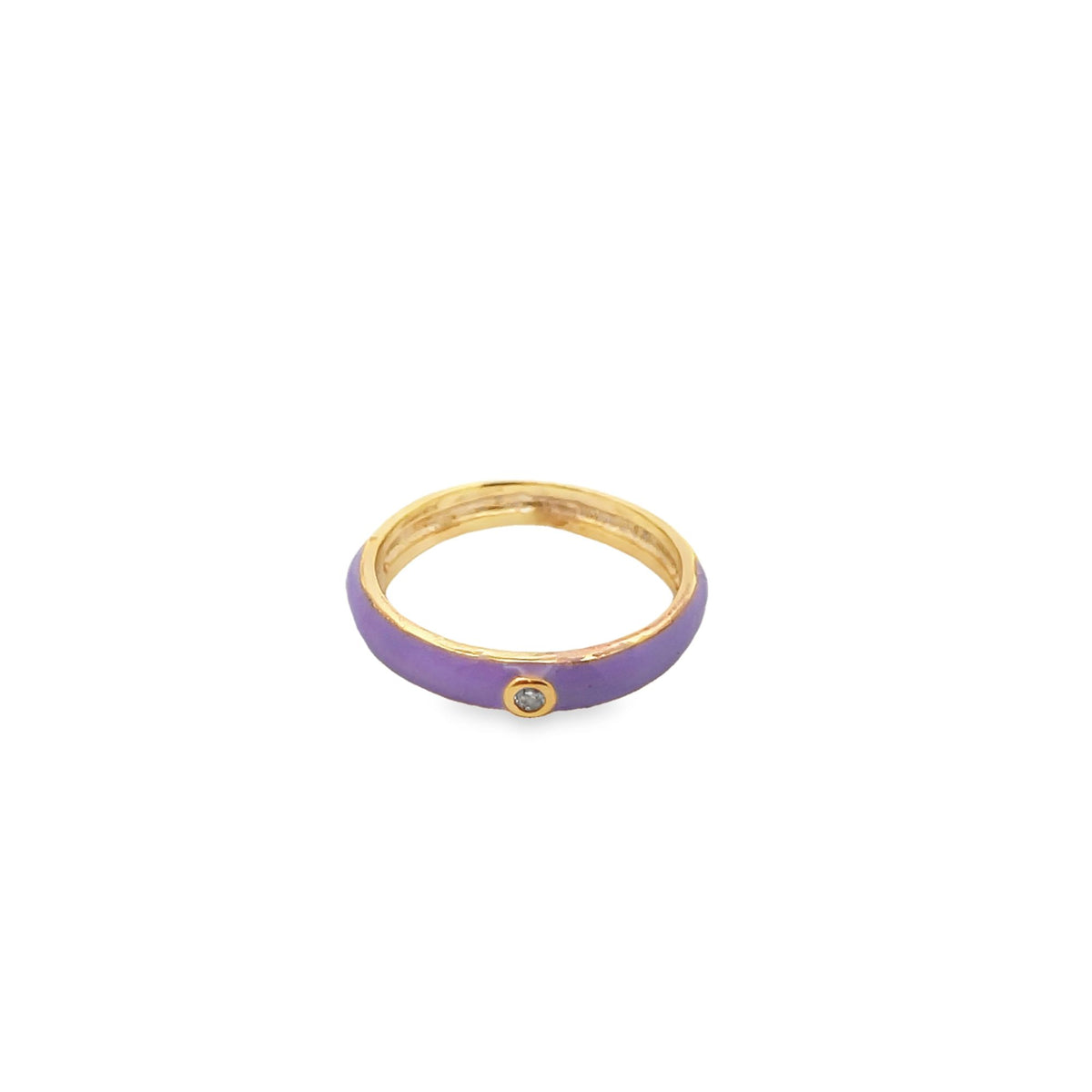 A gold ring features a glossy purple enamel band and a single sparkling gemstone centered on a white background.
