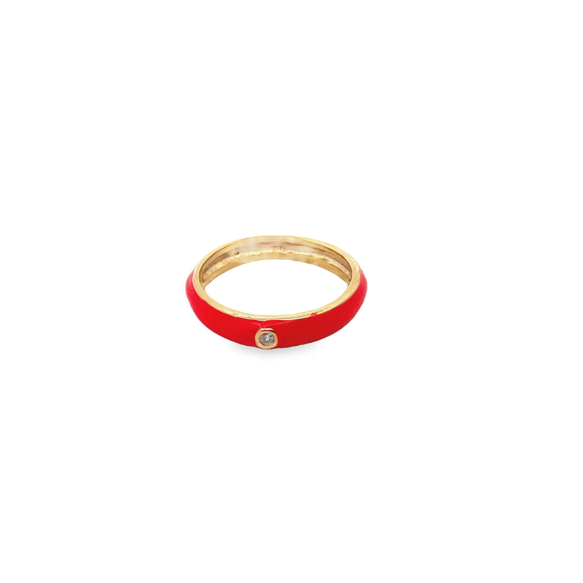 A delicate gold ring features a vibrant red enamel band and a sparkling single diamond set in the center.
