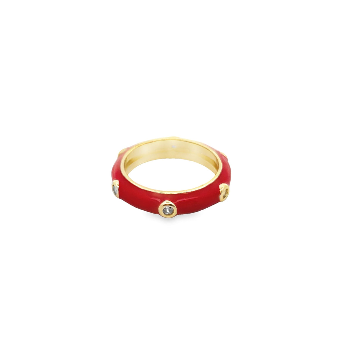 A red enamel gold ring with embedded diamond accents sits isolated on a white background.