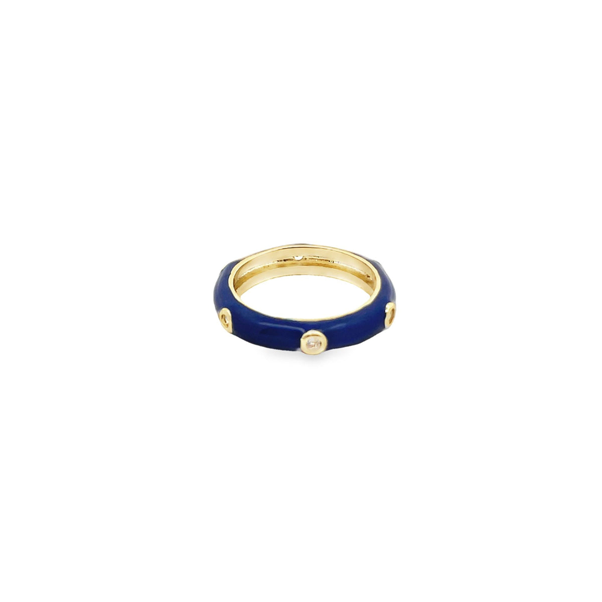 A gold ring features dark blue enamel inlay and sparkling bezel-set diamonds.
