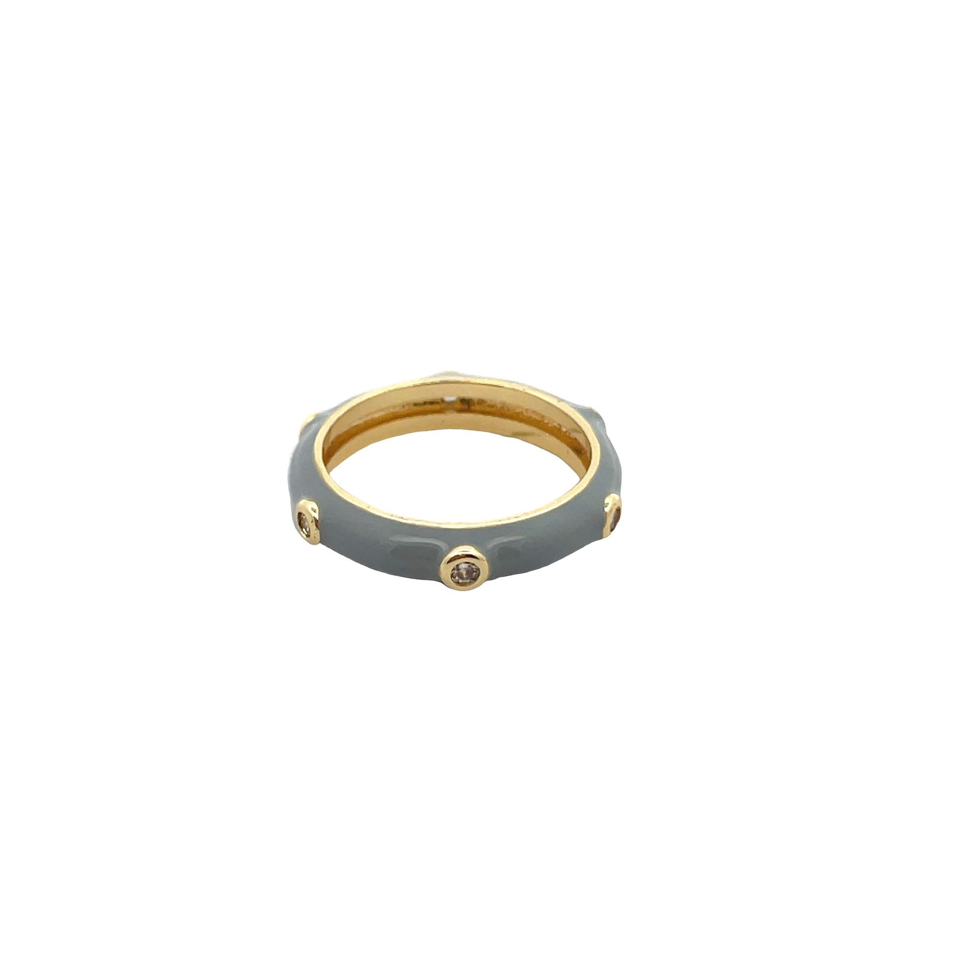 A gold ring features gray enamel and sparkling bezel-set diamonds.