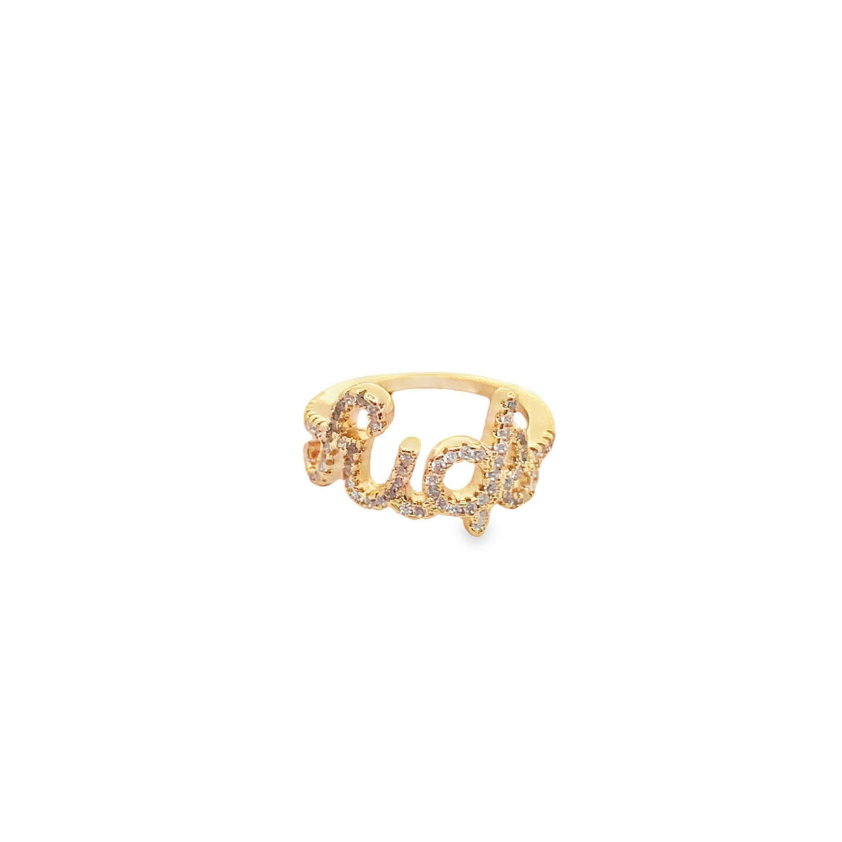 A gold name ring encrusted with sparkling pave diamonds sits centered on a clean white background.