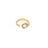 A shiny gold ring with a diamond-pave clasp and link chain design rests against a clean white background.