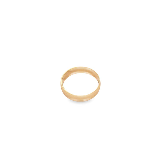 A sleek yellow gold plain band ring rests against a clean white background.