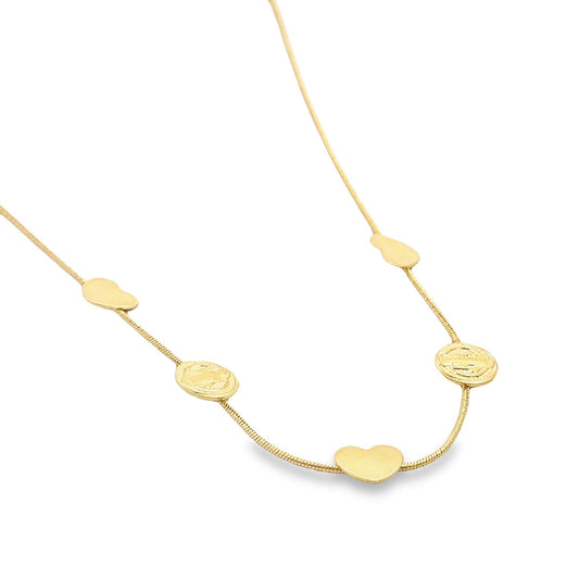 A delicate gold chain necklace dangles against a white background, featuring alternating heart charms and circular medallions.
