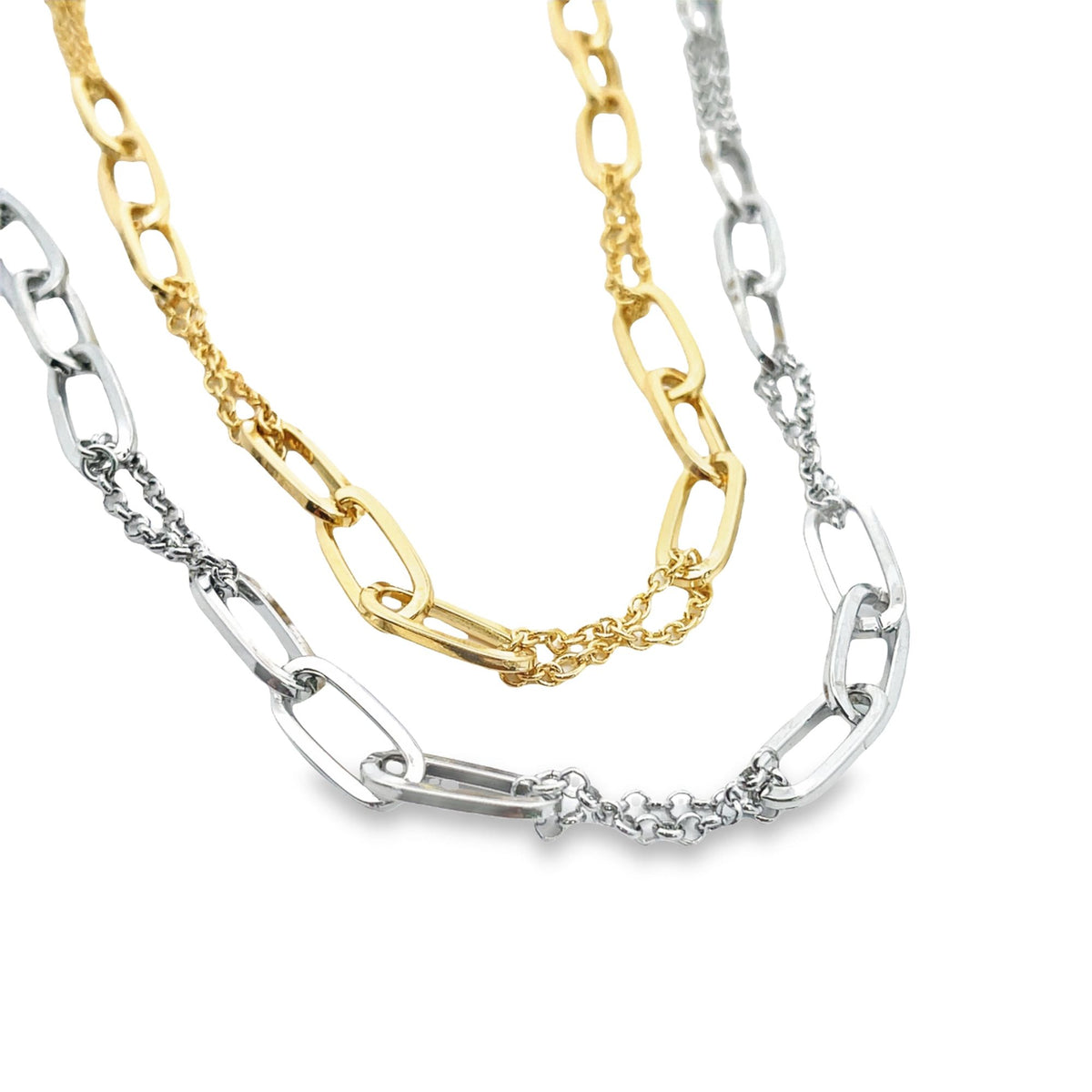 A two-tone layered necklace features interlocking gold and silver paperclip links against a clean white background.