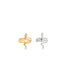 A gold snake ring and a silver snake ring sit side by side on a clean white background.