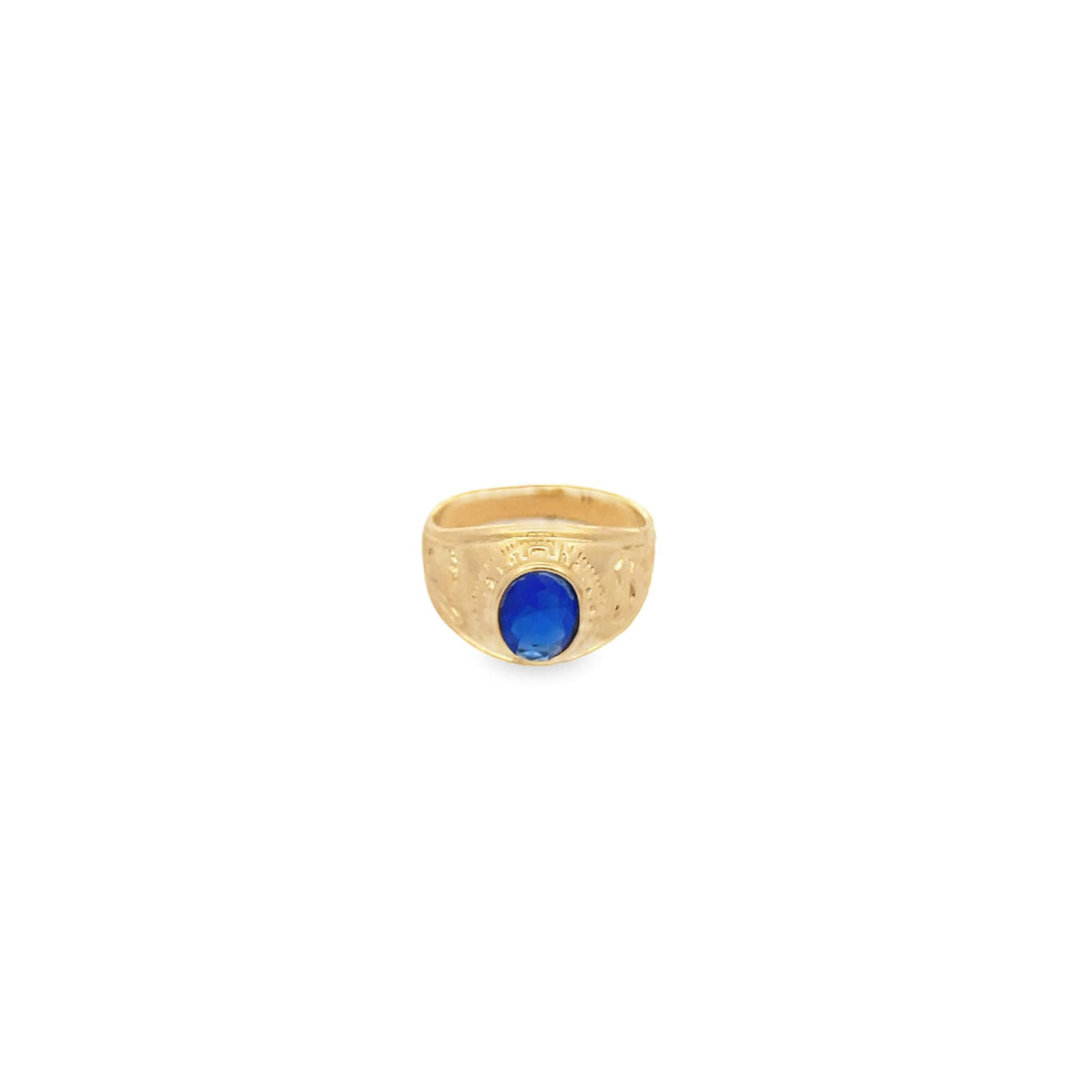 A gold ring features a striking oval blue sapphire gemstone set in the center.