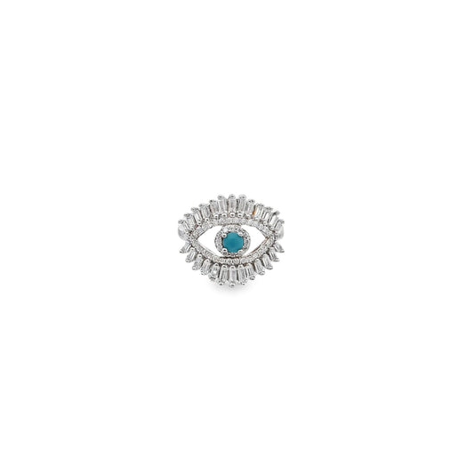A sterling silver evil eye ring sparkles with a bright turquoise center stone surrounded by shimmering white diamonds.