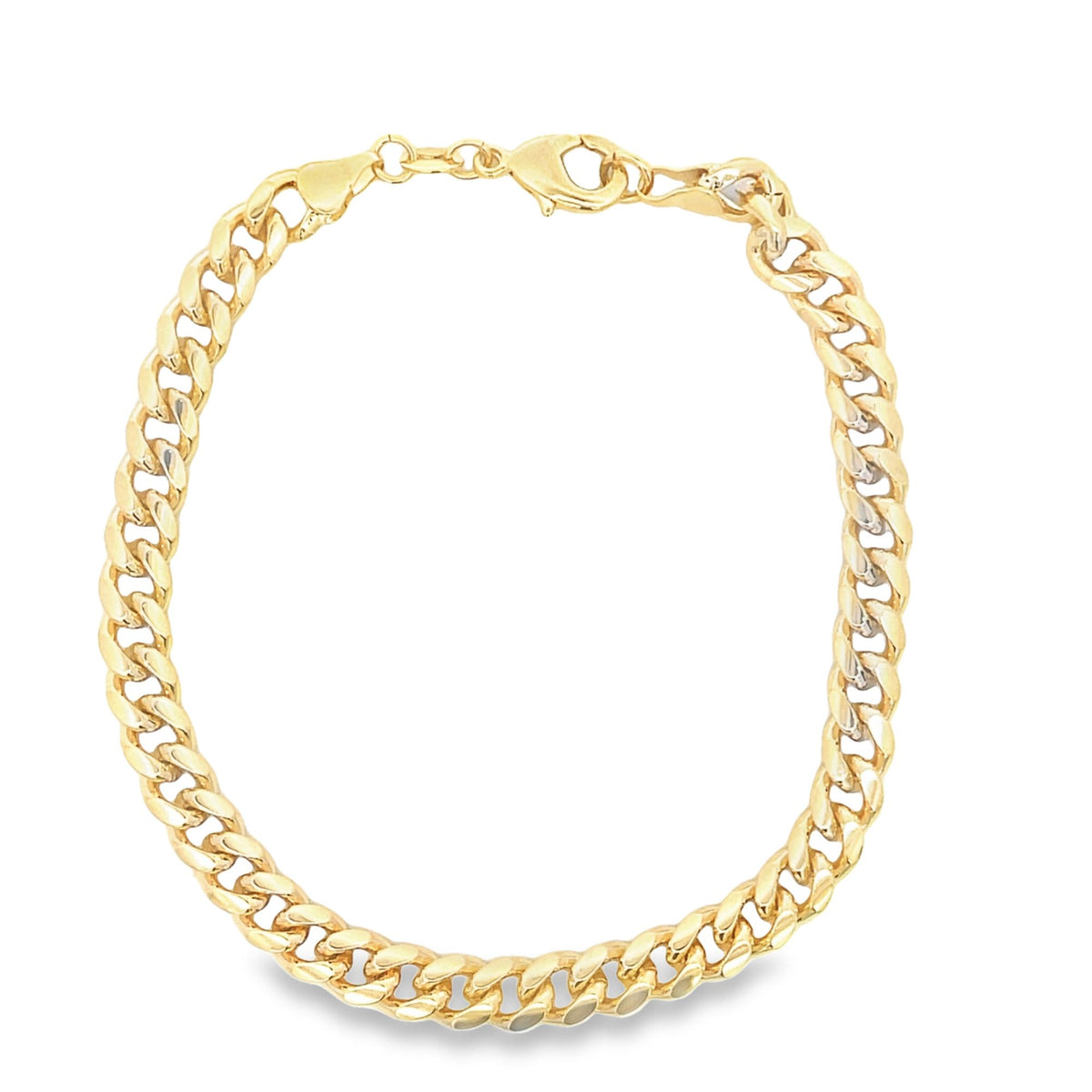 A gleaming gold curb link bracelet rests on a clean white background, showcasing its intricate chain design and secure clasp.