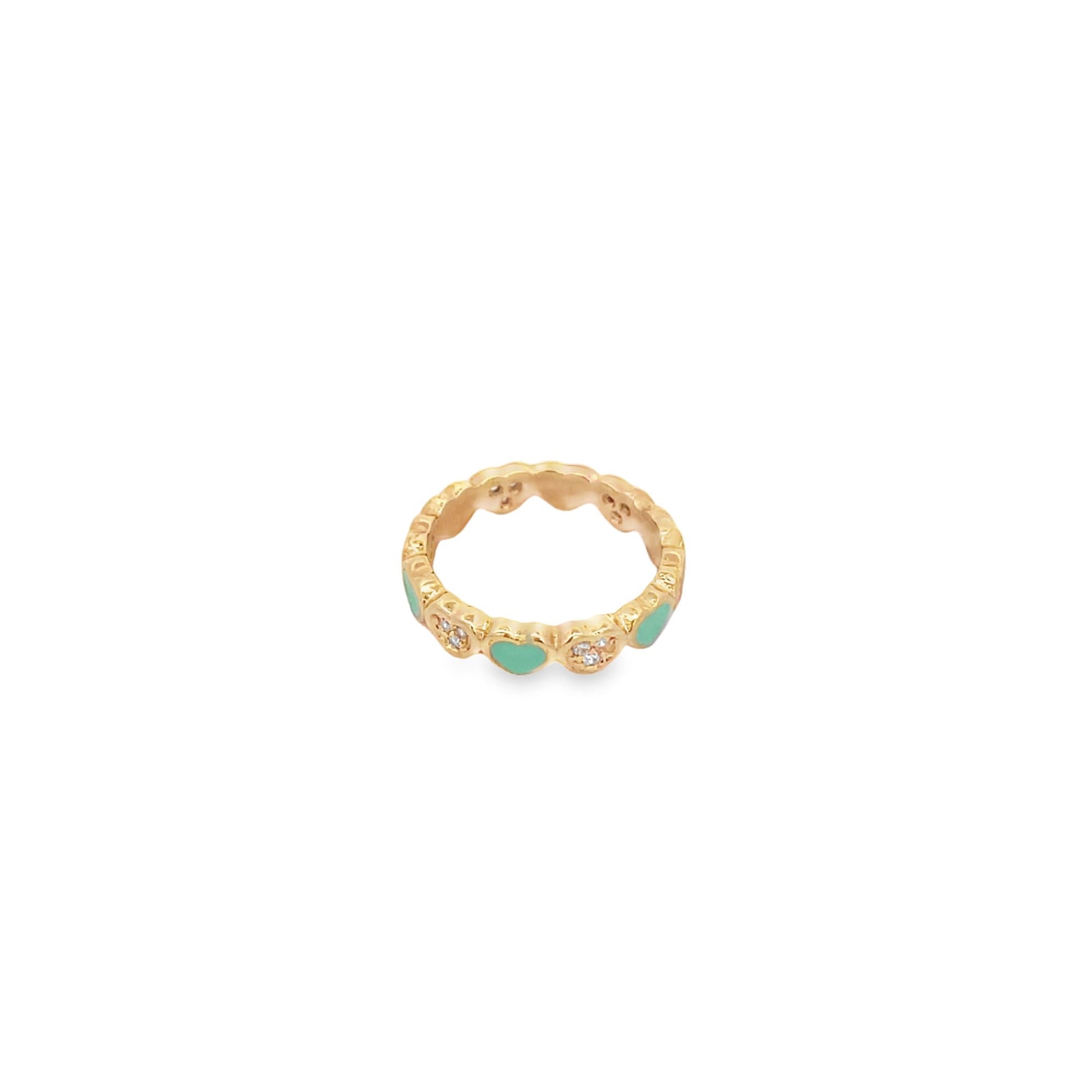 A gold band ring features alternating mint green enamel hearts and sparkling diamond-studded flower motifs against a white background.