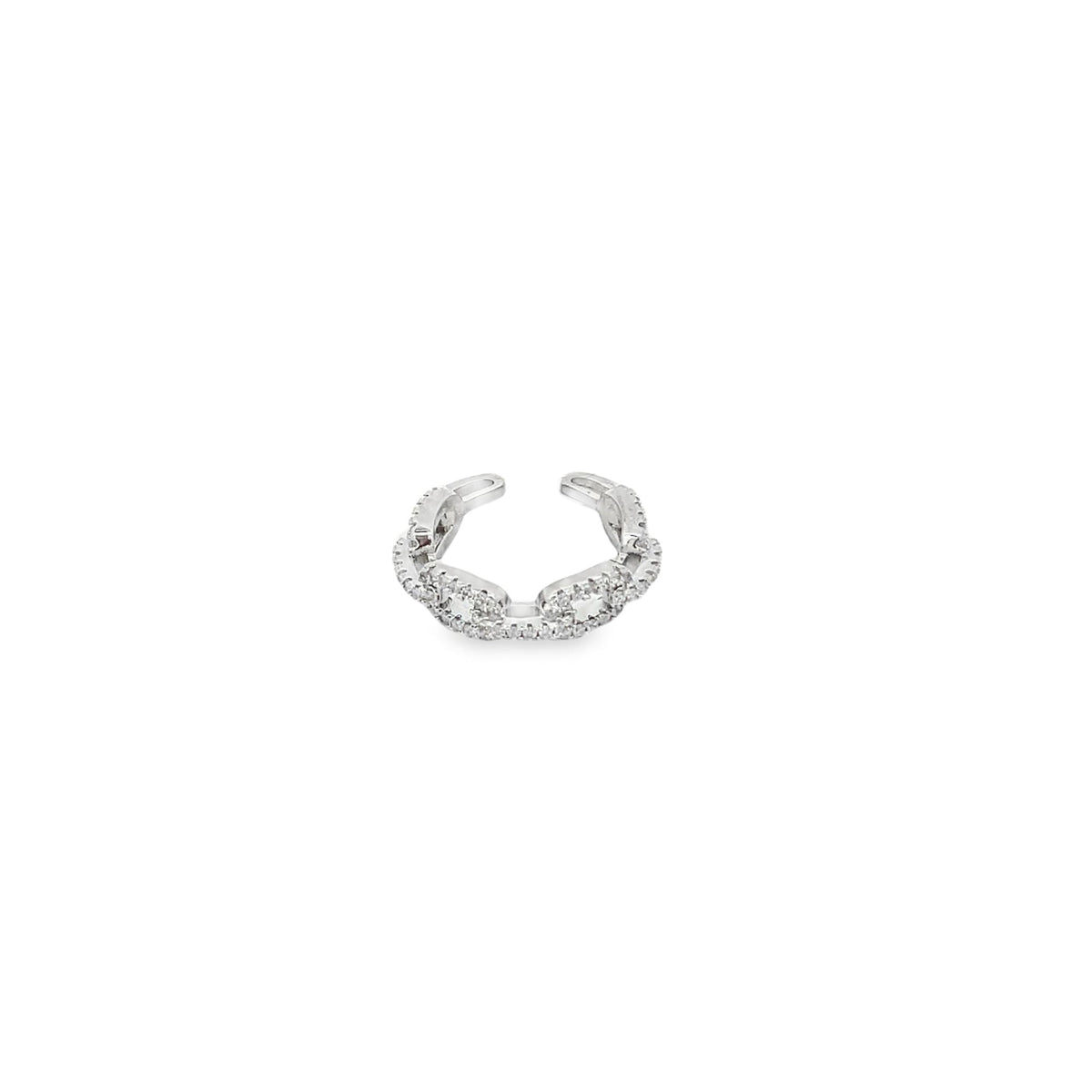 A sparkling silver ear cuff features a delicate, pavé-set diamond chain design against a clean white background.