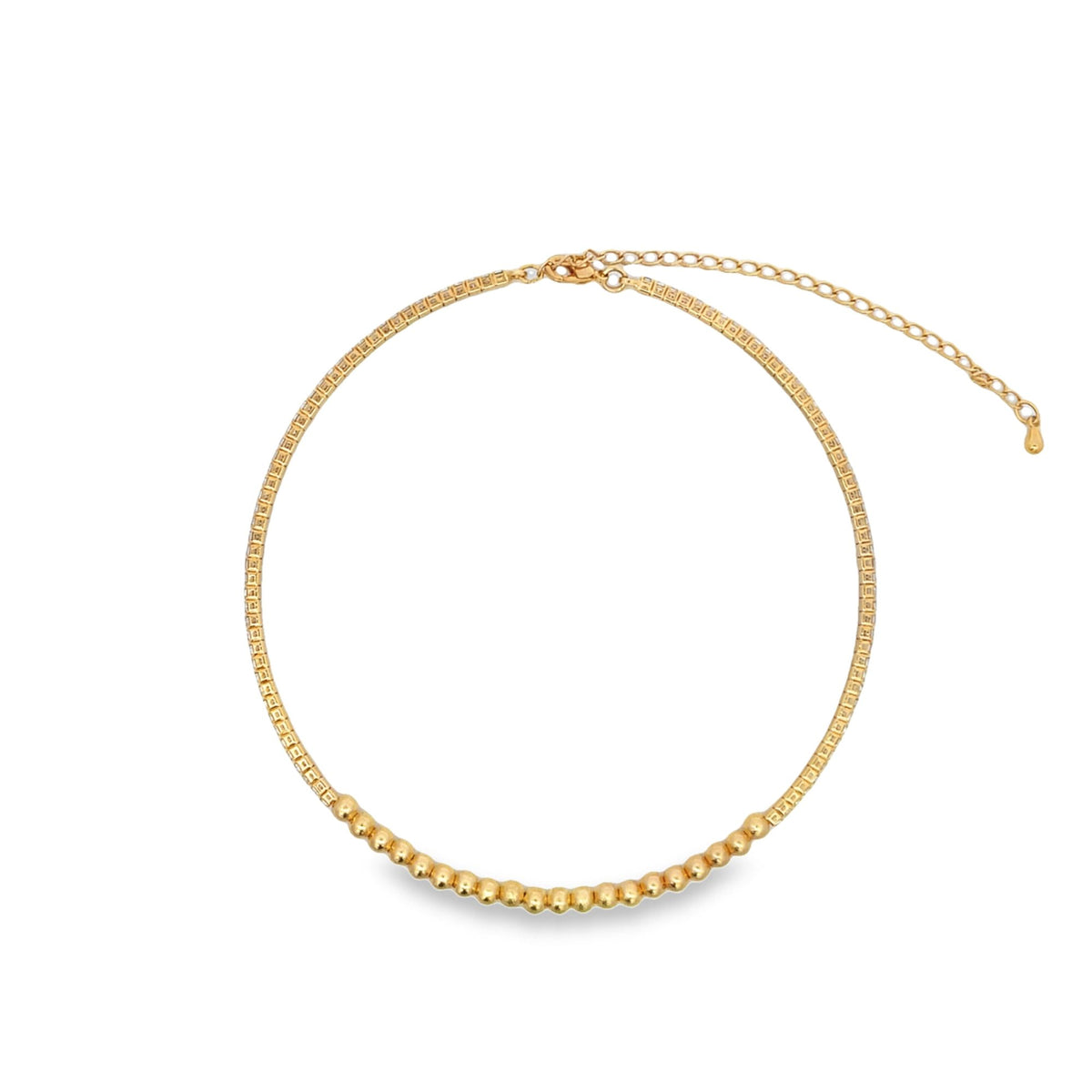 A stylish gold choker necklace features a delicate chain accented with a row of small, polished gold beads along the front and an adjustable extender clasp.