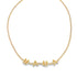 A gold tennis necklace featuring sparkling diamond accents spells out the word "MAMA" with letter pendants.