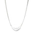 A delicate silver layered necklace features a beaded chain and a sleek snake chain draped elegantly against a plain white background.