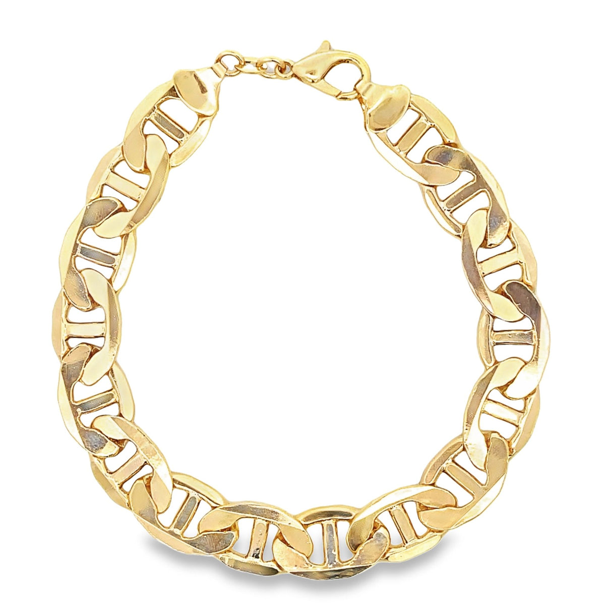 A polished gold Mariner link bracelet curves against a clean white background.