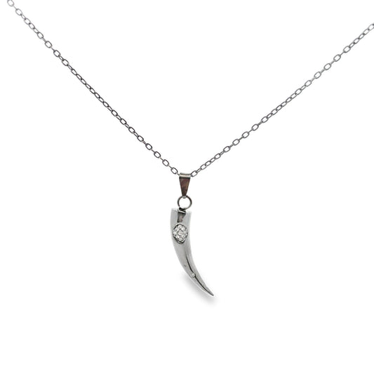 A delicate silver chain holds a sleek horn-shaped pendant accented with sparkling diamonds.