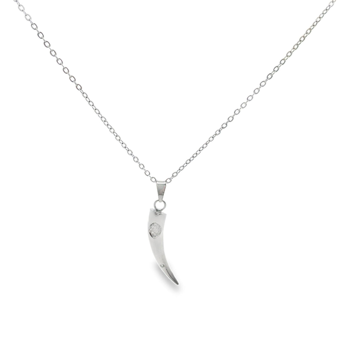 A silver chain necklace displays a curved horn pendant embellished with a sparkling diamond.