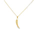 A delicate gold chain holds a gleaming horn-shaped pendant accented with sparkling diamonds.