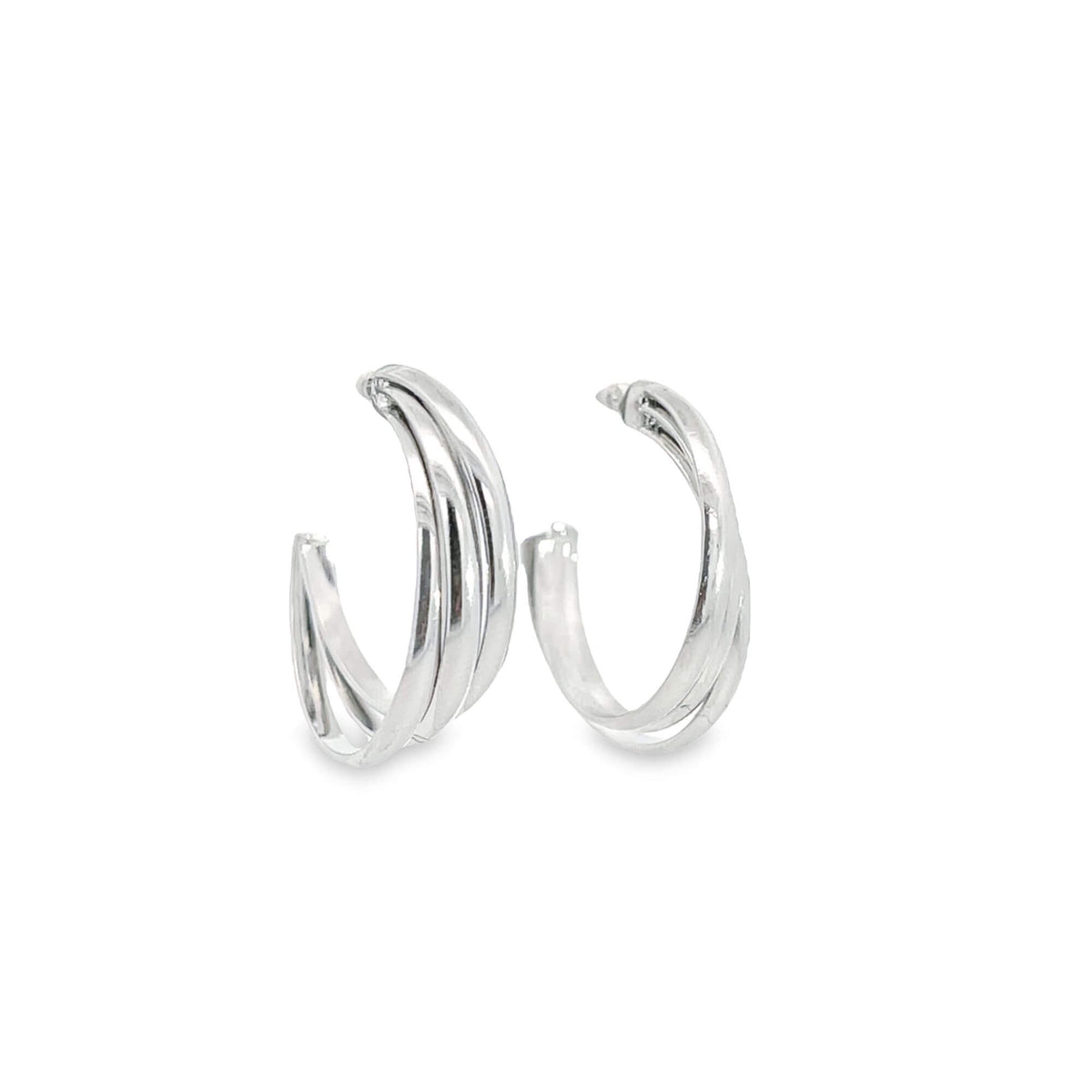A pair of polished silver triple-band hoop earrings rests against a clean white background.