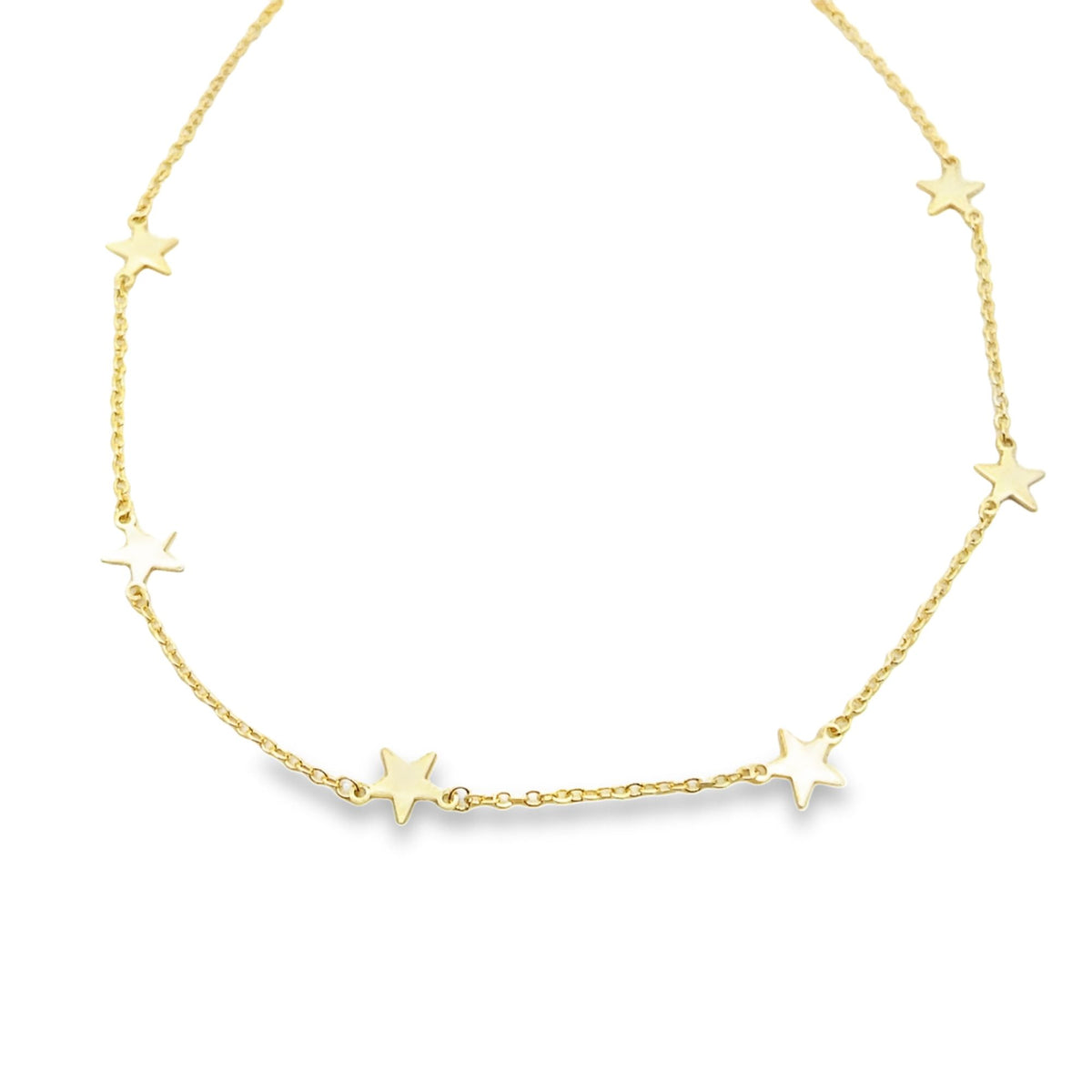 A delicate gold chain necklace features scattered star charms against a clean white background.