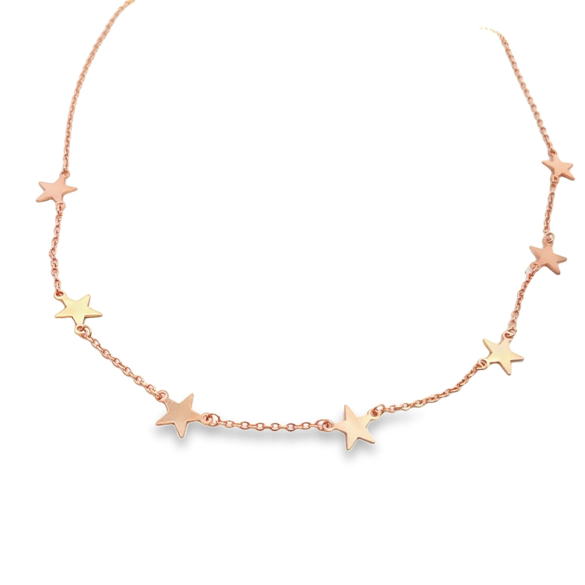 A delicate rose gold star pendant necklace displays multiple small star charms spaced along a fine chain against a white background.