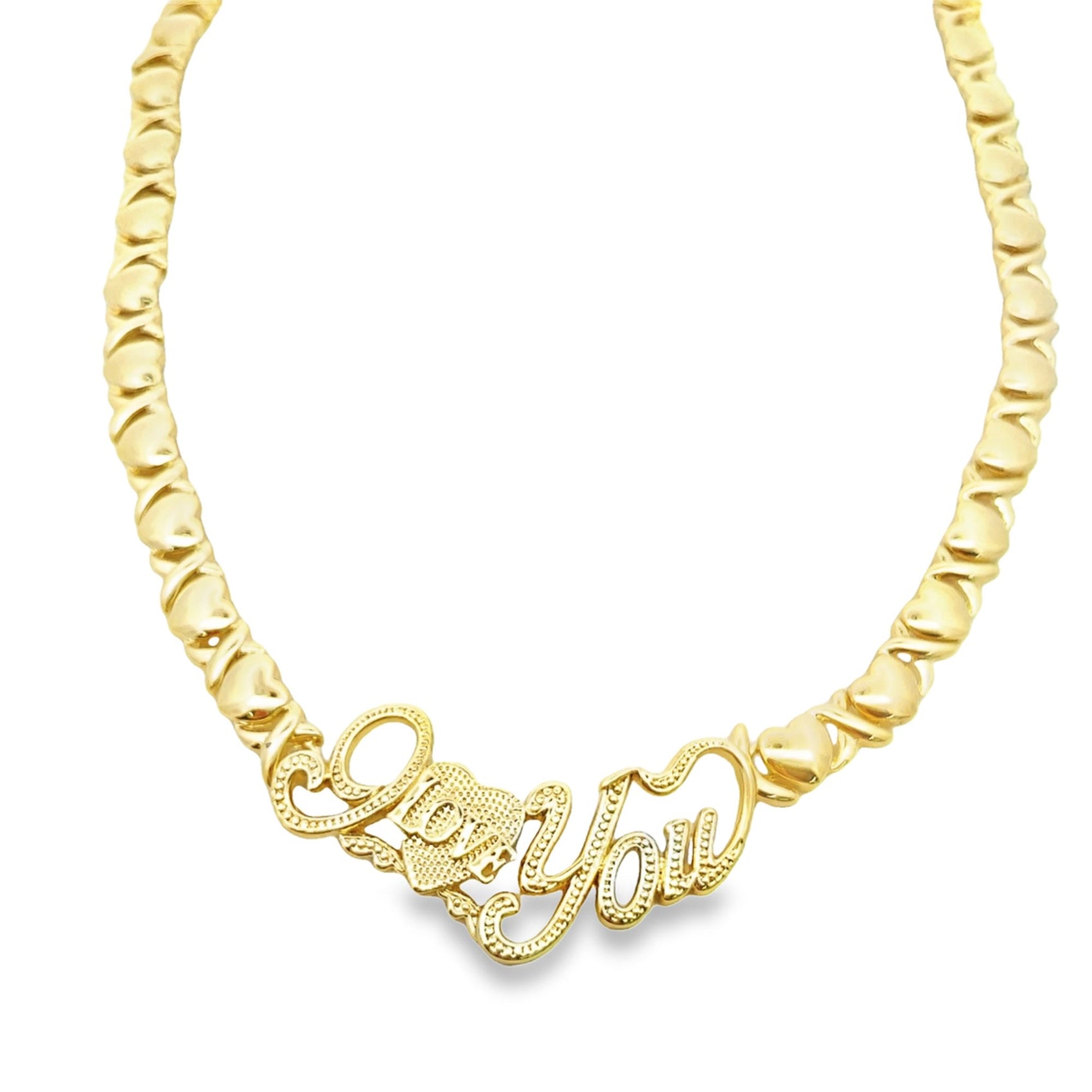 A gold "I Love You" necklace featuring a textured heart pendant rests against a plain white background.