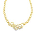 A gold "I Love You" necklace featuring a textured heart pendant rests against a plain white background.