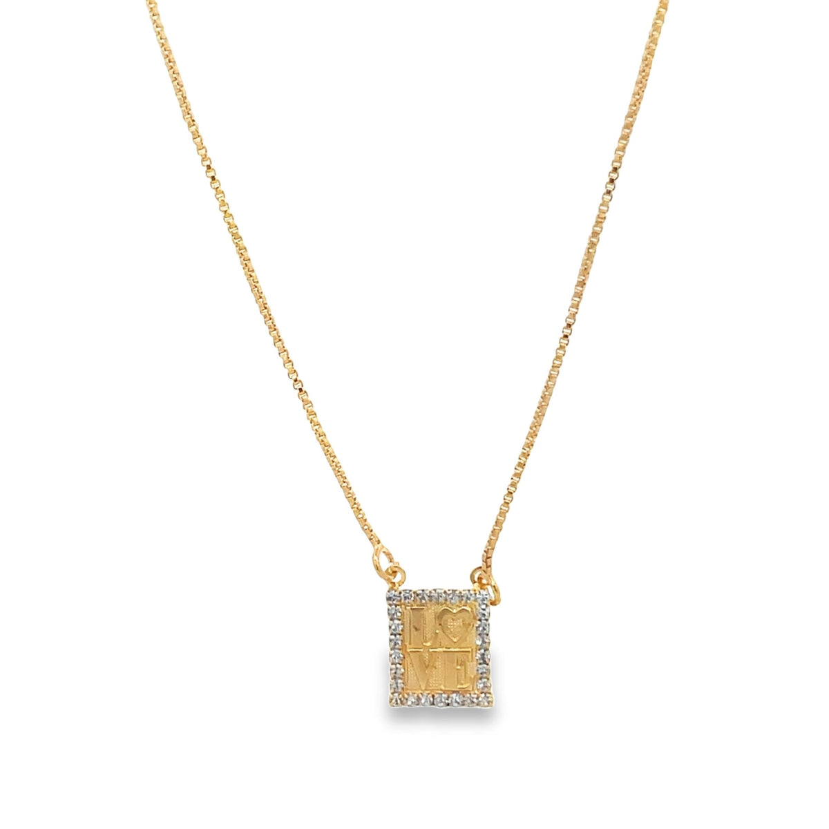 A delicate gold chain necklace suspends a rectangular pendant featuring the word "LOVE" bordered by shimmering diamonds.