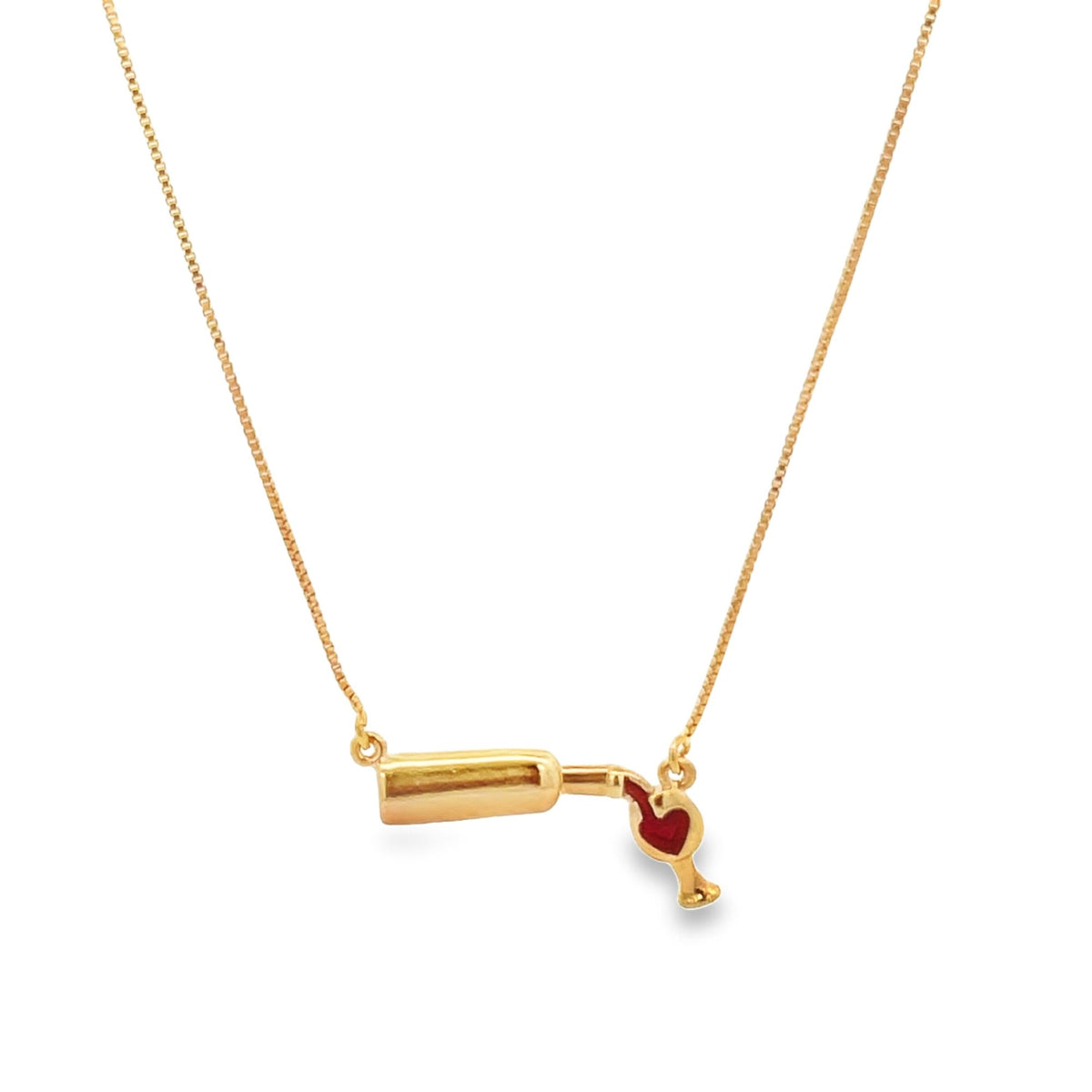 A delicate gold necklace features a pendant shaped like a wine bottle pouring red wine into a glass.