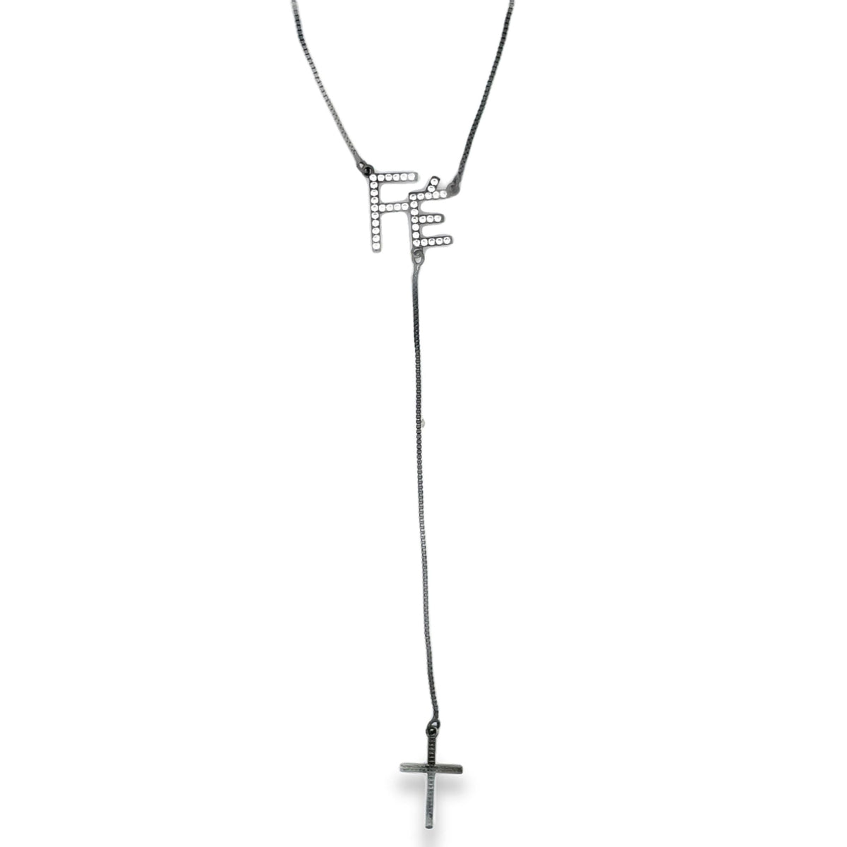A silver y-necklace features a sparkling rhinestone-embellished 'Fé' pendant and a small cross charm hanging below against a clean white background.