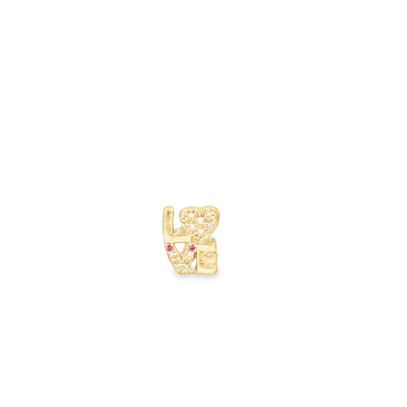 A delicate gold love charm earring features sparkling diamonds and small red gemstone accents.