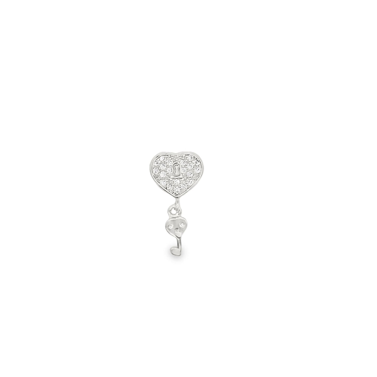 A silver heart lock charm, encrusted with sparkling cubic zirconia, dangles a matching tiny heart-shaped key against a clean white background.