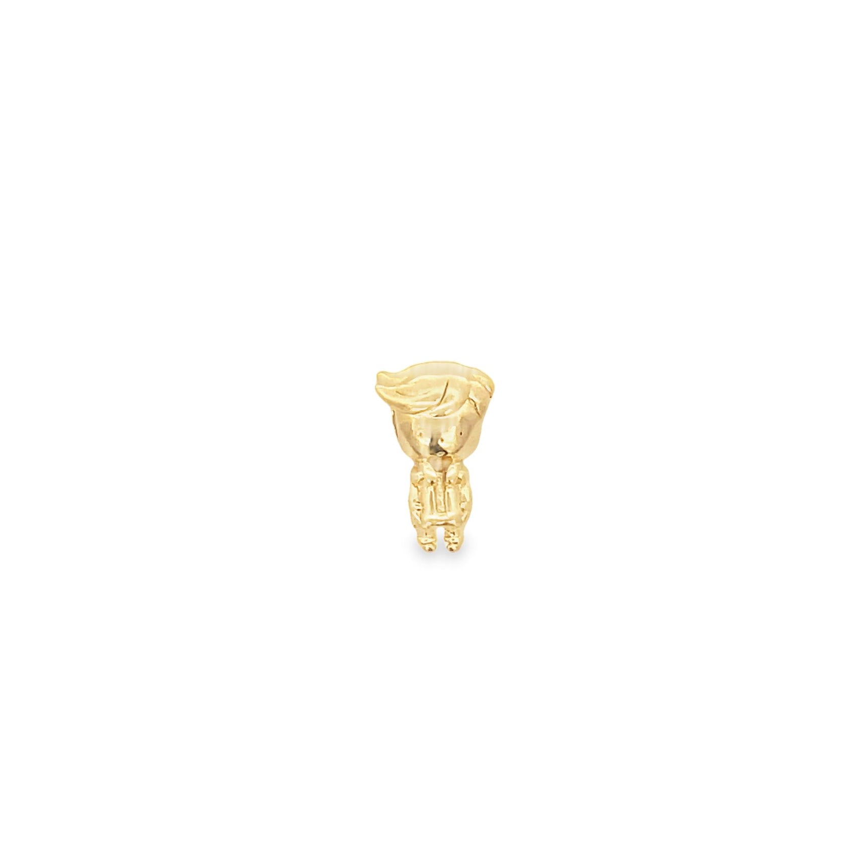A shiny gold stud earring shaped like a tiny cartoon boy stands against a plain white background.