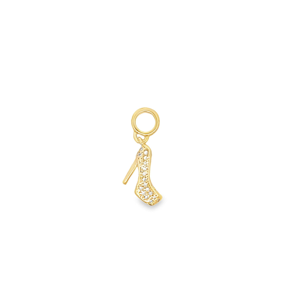 A gold high heel shoe pendant sparkles with embedded cubic zirconia stones against a white background.